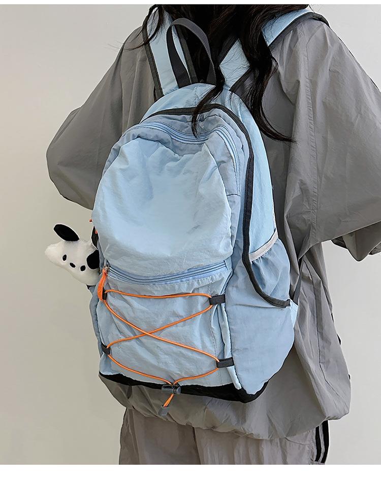 New Style Lightweight Backpack for Junior High Students - Unisex Double Shoulder Bag for Sports, Outdoor, and Mountaineering, Large Capacity.