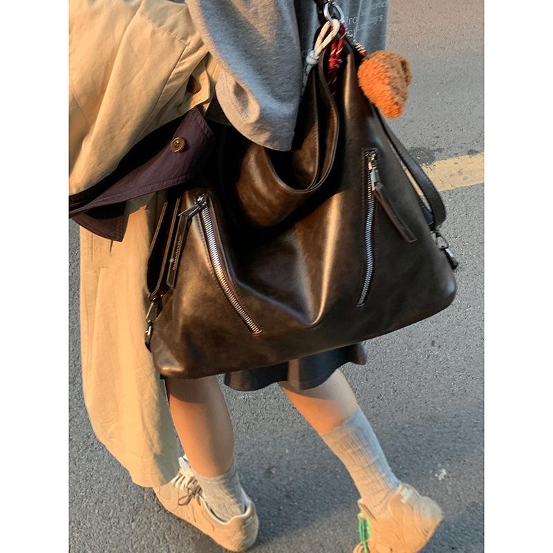 

Tote bag New commuter large-capacity messenger bag Travel women s bag Backpack Bucket bag Luggage коричневий