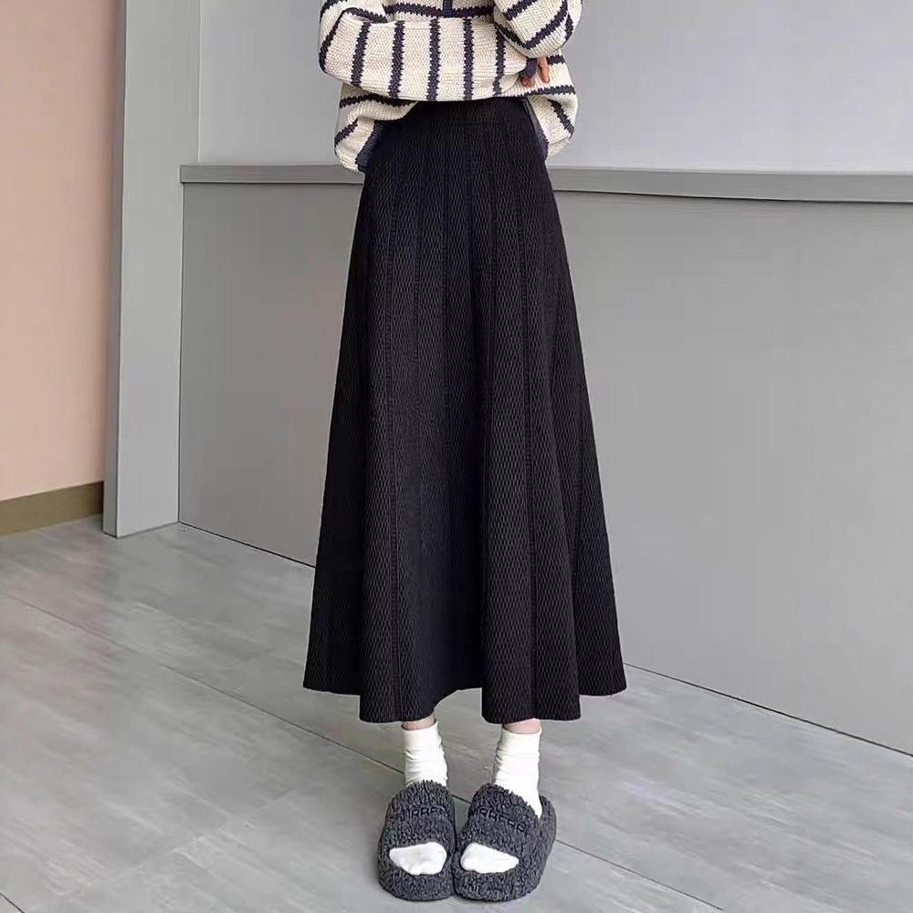 European, American autumn and winter new solid color elastic waist design sense texture medium and long versatile skirt foreign style knitted skirt