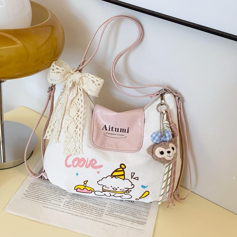 New cute foreign style niche fashion simple commuting texture versatile shoulder bag 2025 summer new women's bag tide