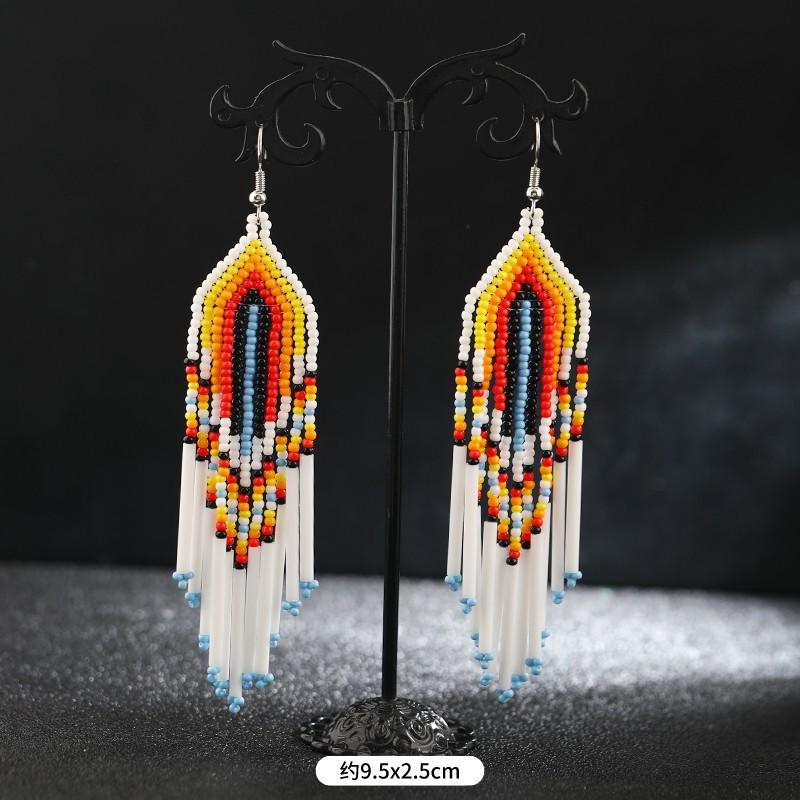 Brincos longos de borla feitos à mão com contas de arroz, nicho retrô boêmio, brincos de férias personalizados e estilosos