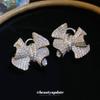 Silver Needle French Niche Zircon Pleated Bow Earrings Simple and Fashionable Personalized Earrings Light Luxury High-end Stud Earrings