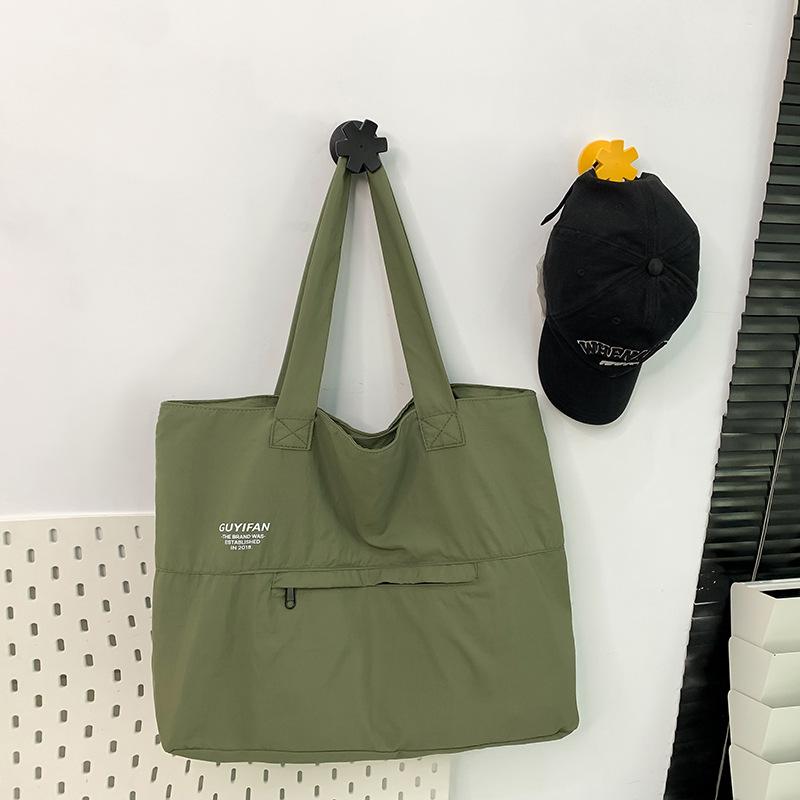 Premium skulderveske Lettvekts tøyveske for menn Anti-sprut fritid Bærbar pendlerveske med stor kapasitet