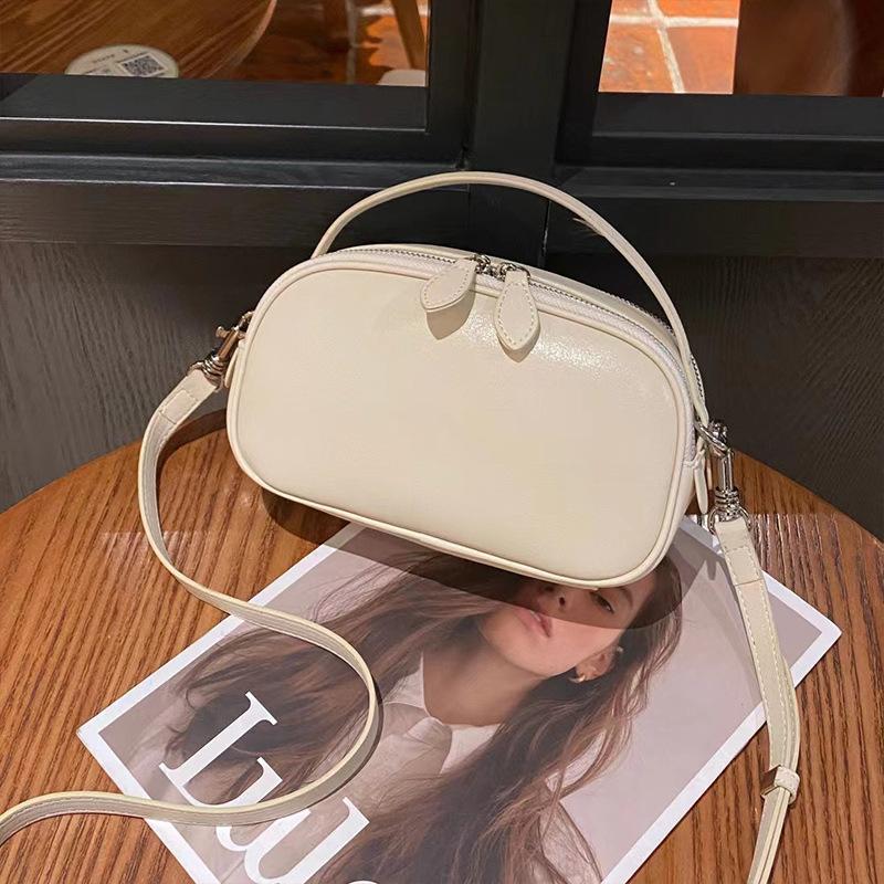 

2025 Новая простая модная женская сумочка, ощущение высокого класса, сумка через плечо, универсальная женская сумка из натуральной кожи 22*13*8.5 белый