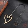 New hollow brushed love alloy pendant, irregular peach heart women's long leather rope sweater chain