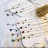 Elegant Five-Flower Double-Sided Four-Leaf Clover Stainless Steel Necklace with Tassel Pendant