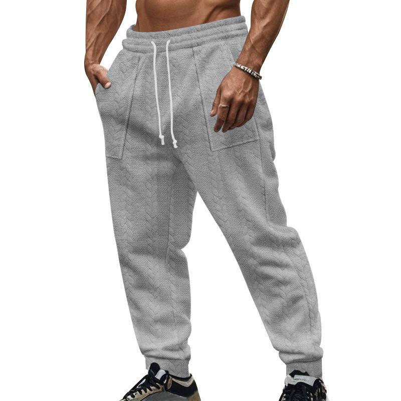 

New men s vintage-style casual sports trousers in a solid colour with a jacquard pattern and drawstring S сірий колір