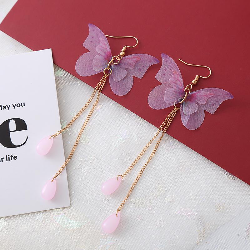 Purple Tassel Butterfly Pearl Earrings: Bold and Elegant Design