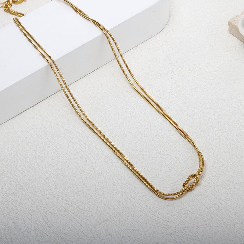 Halskette aus Edelstahl, europäischer und amerikanischer Stil: Runde Schlangenkette Titan & Knoten-Design für Paare