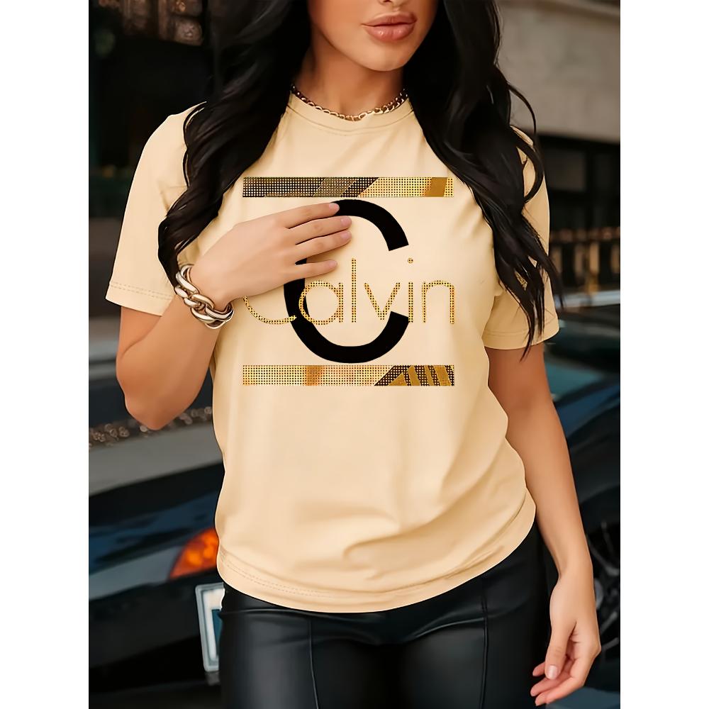 Calvin Brevtryck Dam T-shirt - Guld Grafik Grön Casual Topp