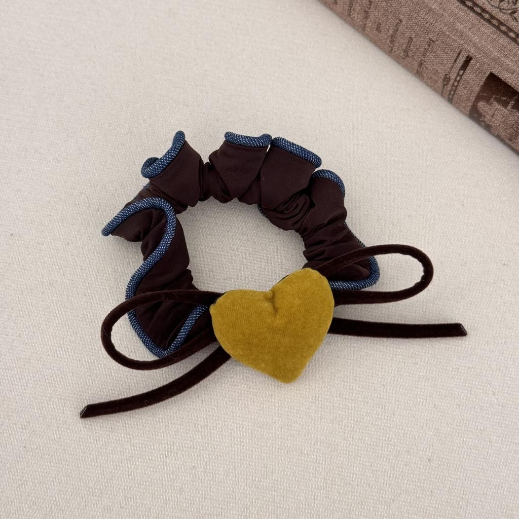 Samtherzförmige Schleife Haargummi und Stirnband sind vielseitig zum Binden von Dutts und als Haaraccessoires