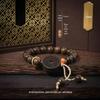 Golden Silk Phoebe Wood Bracelet with Ghost Flower Pendant - Unisex Cultural Prayer Beads