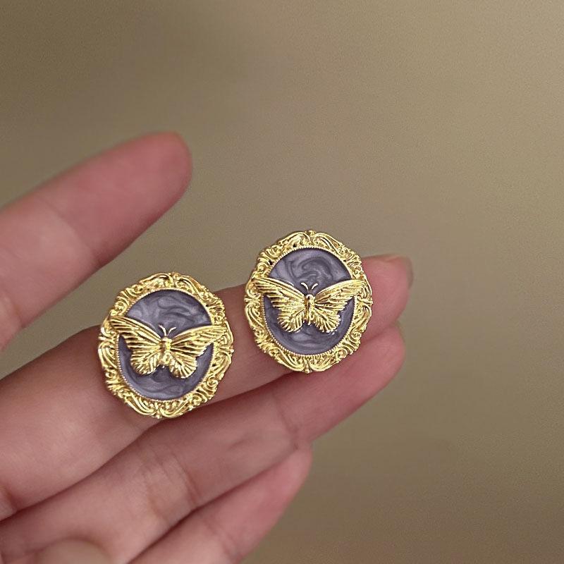 Premium French retro butterfly drop glaze metal earrings light luxury niche design temperament stud earrings women s ear jewelry