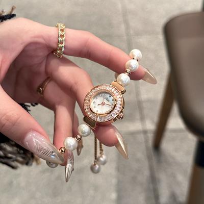 Neue Perle Armband frauen Uhr Licht Luxus Elegante Strass Shell Disc Quarzuhr