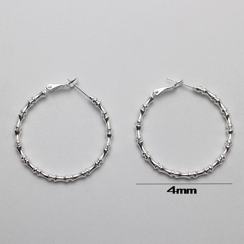 Silver-Plated Copper Bamboo Joint Large Round Hoop Earrings with Classic Face-Shaping Design and Plain Earring Backs.