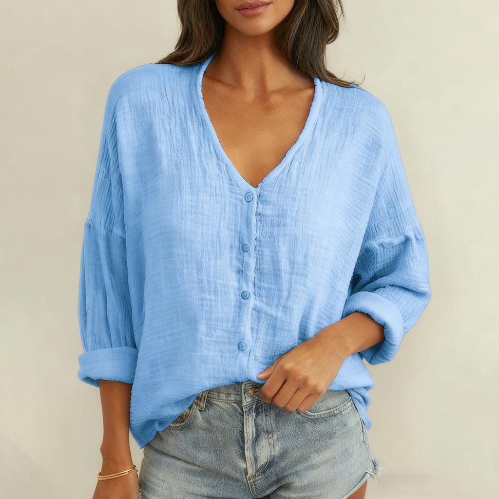 Damenmode, einfarbiges, langärmeliges, locker sitzendes Hemd mit V-Ausschnitt und Knöpfen