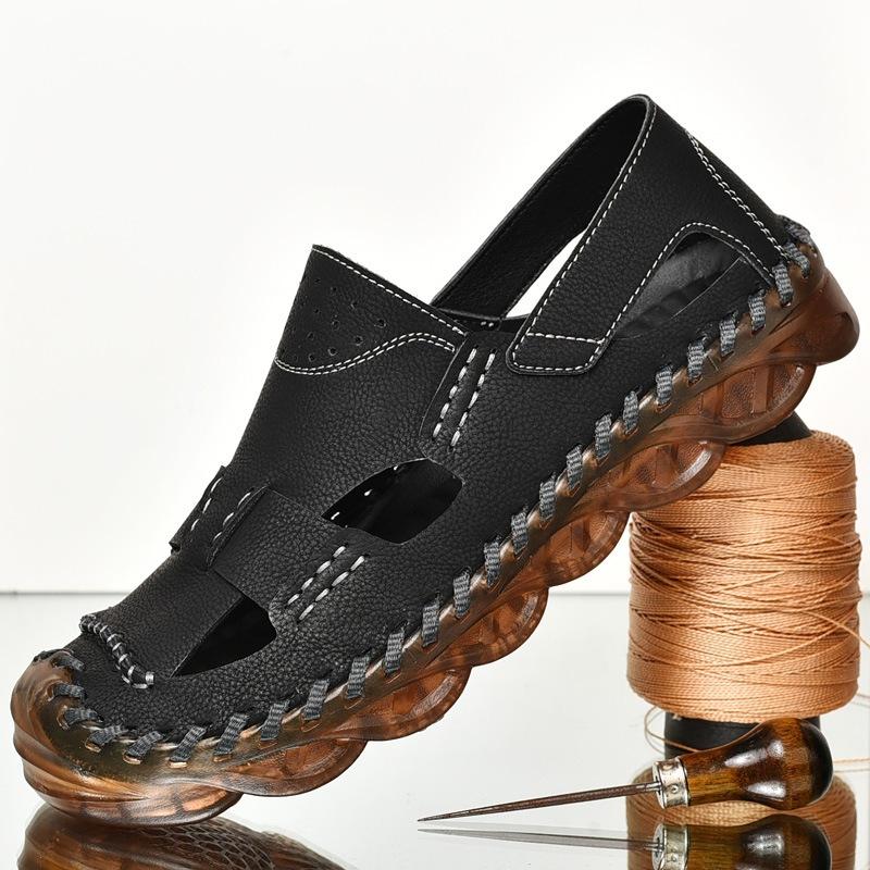 

2025 импортная мужская обувь летняя новая сумка-голова коровья кожа дышащие сандалии пляжная обувь для отдыха на открытом воздухе полые стопы вождение обувь 38