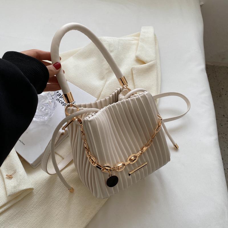 

Высококлассная нишевая дизайнерская сумка-ведро, новая универсальная плиссированная сумка через плечо, сумка-тоут, женская ручная.