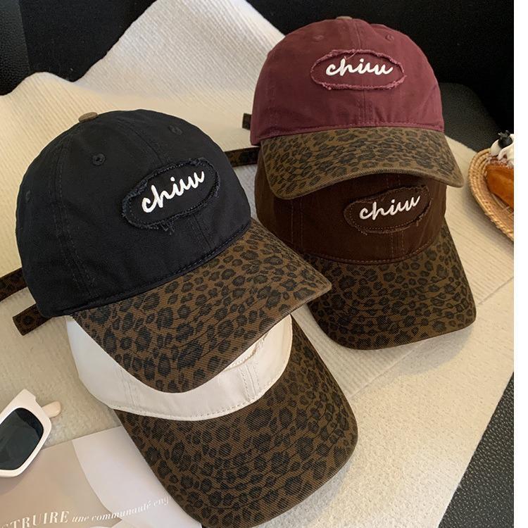 Korean retro-style leopard print baseball cap, a versatile and stylish accessory for women, offering sun protection and a color-blocked design that