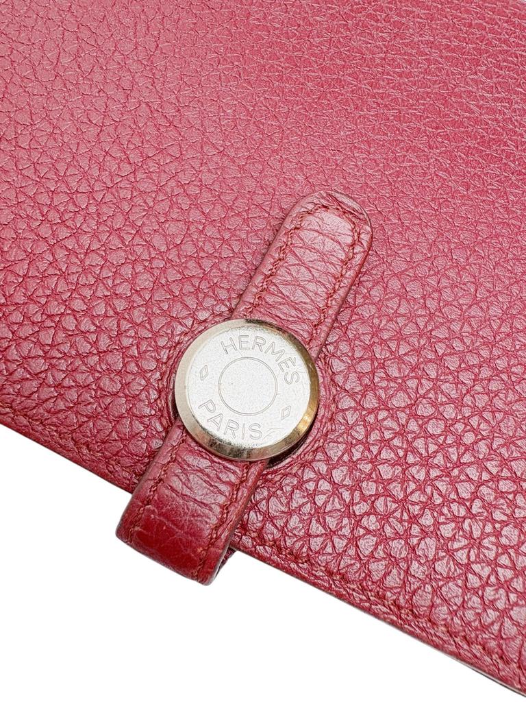 Použitá dlouhá peněženka Hermès Dogon GM v barvě vínová rubínová, stříbrné kování