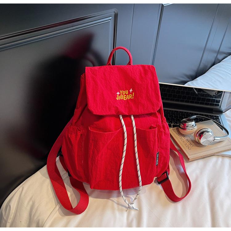 

Casual large-capacity backpack women s 2025 new Korean lightweight mountaineering travel bag solid color student schoolbag бордовый