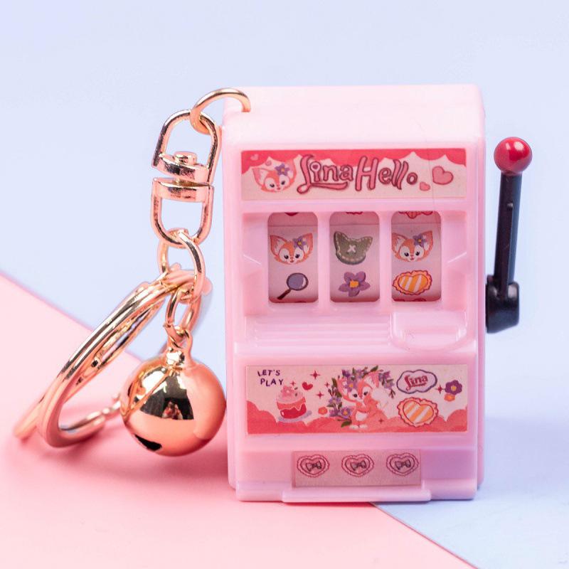 Mini Fruit Machine Keychain – Creative Bag Accessory, Fun Toy Gift & Charm.