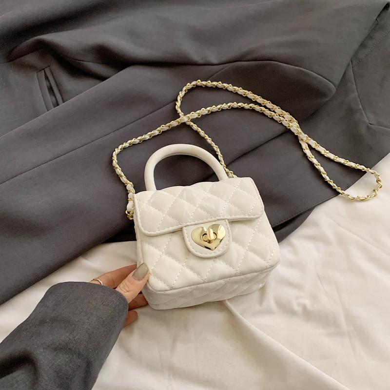 

Fashionable Korean Style Unisex Kids Mini Shoulder Bag With Heart Lock Closure And Trendy Quilted Design For Preschoolers White No Charm
