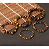 Bracciale Occhio di Tigre alla Moda Uomo e Donna Fascino Gioielli in Pietra Naturale Buddha Curativo Corda Elastica Bracciale con Perline di Cristallo per Coppia