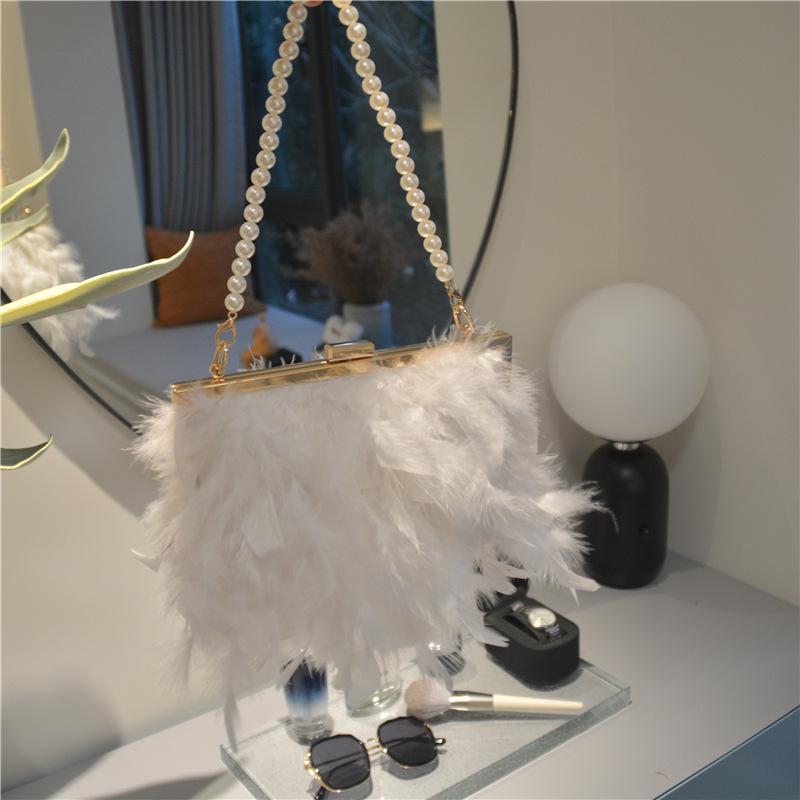 

2025 Fashion Luxury Ostrich Long Feather Tassel Women s Wedding Evening Clutch Bag Party Pearl Handle Handbag Crossbody Purse