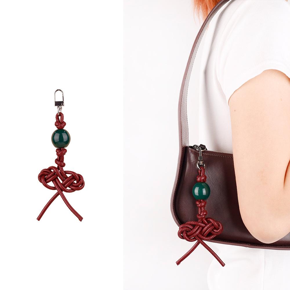 MIU series creative color hand-woven ruyi knot pu leather cord accessories bag pendant keychain