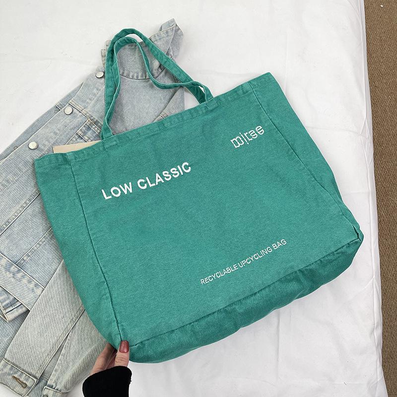 Autumn new product embroidery English washed denim large capacity simple bag to work commuter bag women