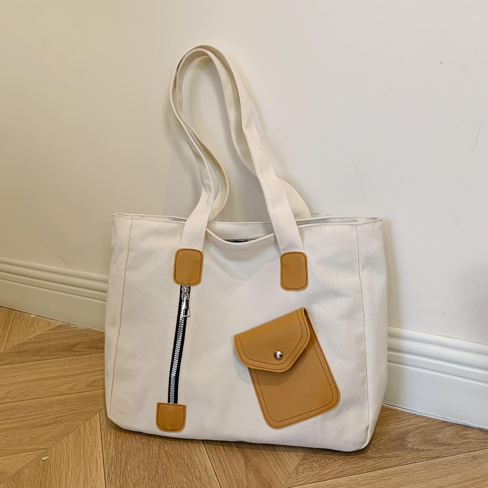 

Tote bag niche design female college students class shoulder bag 2024 winter new commuting large-capacity handbag коричневий