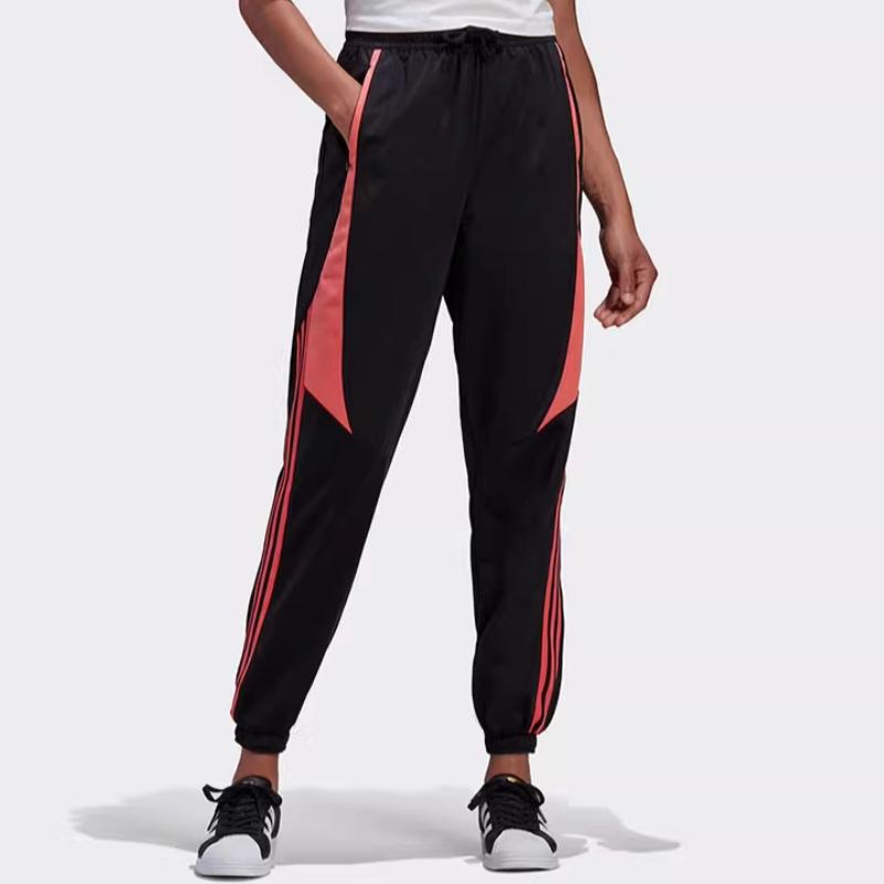 Adidas Originals Trainingshose zum Schnüren mit Bündchen Retro Stricksporthose Damenhose Schwarz Orangerot GC6765