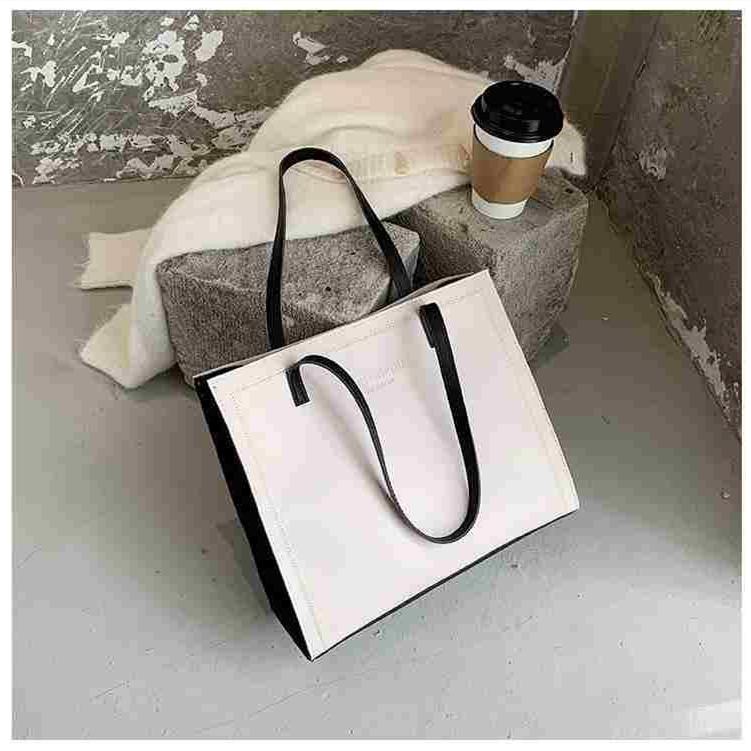 Женская однотонная большая вместительная сумка-тоут для отдыха из искусственной кожи — фото 14