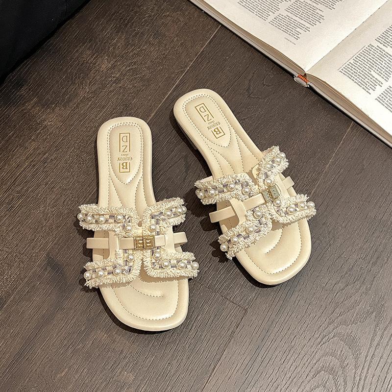 Xiaoxiangfeng plattbottnade coola tofflor dam sommar designkänsla mode bär fe-stil mjuk sula avslappnad pärla enords toffel