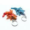 Articulated 3D Printed Baby Dragon Keychain: Shining Decompression Toy & Handicraft Gift Ornament