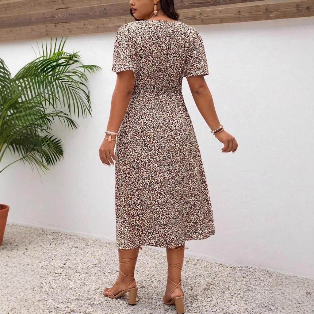 Elegantes Übersee-Leopardenmuster Übergrößenkleid - Damen Kurzarm Verdrehtes Design