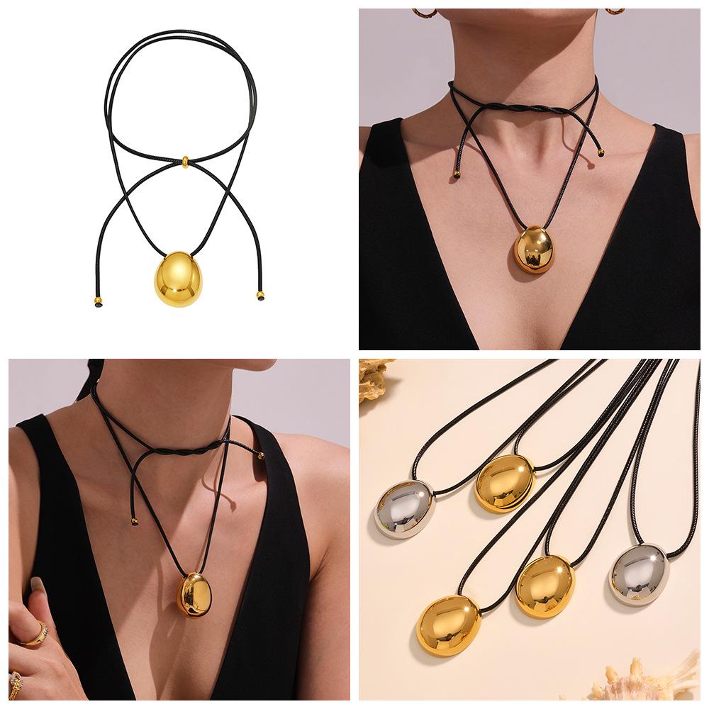 Oumika Geometric Pendant Necklace: High-Polished Stainless Steel with Black Cord, Clavicle-Length, Non-Fading, European & American Style.