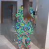 Women Plus Size Coordinated Two Piece Set Round Neck Three Quarter Sleeve Irregular Hem Top Printed Wide Leg Pants