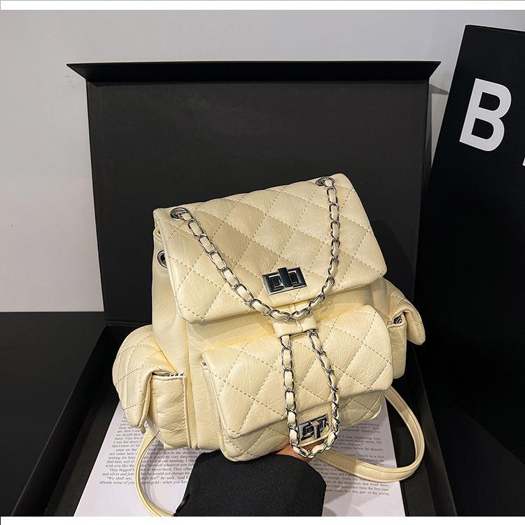 

2025 Xiaoxiangfeng backpack women s summer new niche high-end foreign-style large-capacity chain backpack жёлтый