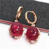 Purple Gold Earrings Are Plated With Rose Gold And Luxuriously Set With Cabochon Ruby Earrings And Cat'S Eye