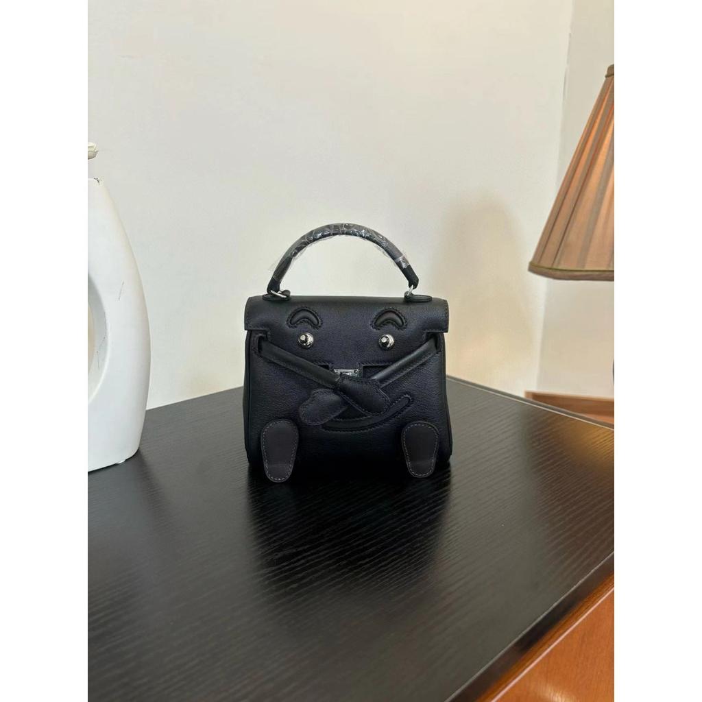 Borsa a faccina sorridente nuova per la primavera e l'estate 2025 borsa Kelli mini in pelle bovina di primo strato di alta gamma borsa a tracolla carina da millenial