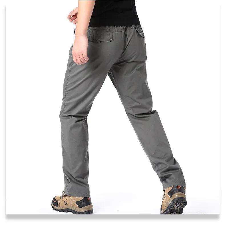 Wiosenne jesienne modne spodnie casualowe dla mężczyzn bawełniane spodnie cargo w jednolitym kolorze z elastyczną talią proste nogawki streetwear męskie spodnie joggers