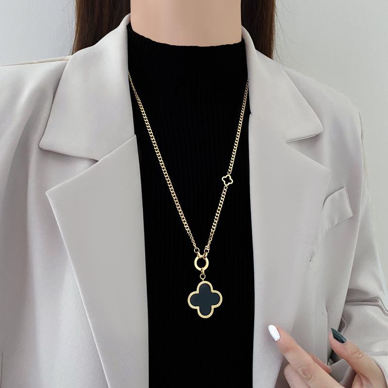 Stunning JMXD Titanium Steel Four Leaf Clover Pendant Sweater Chain Necklace High End Elegant Womens Fashion Jewelry Lucky Charm Gift Idea