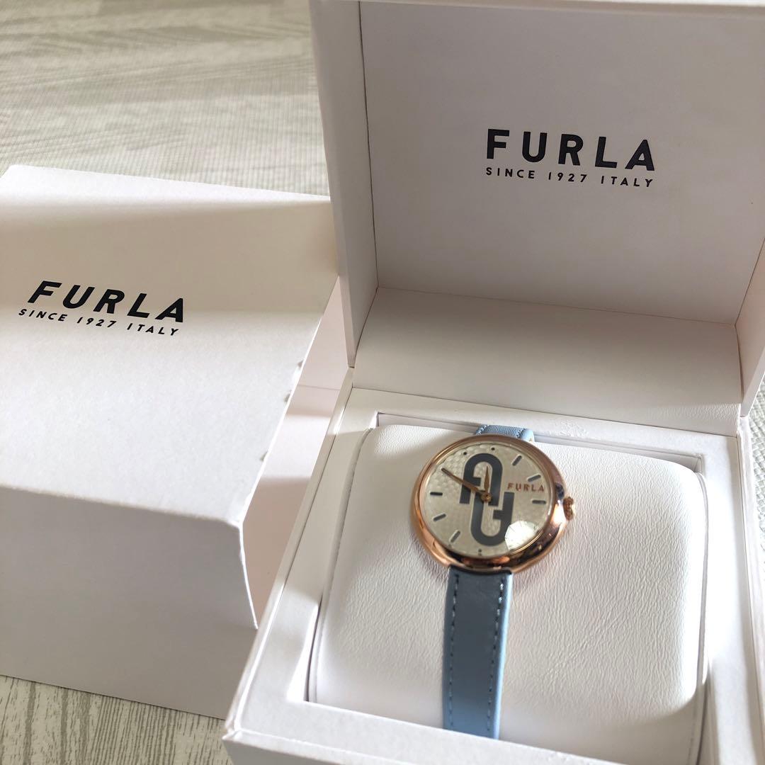 Used FURLA analog clock blue