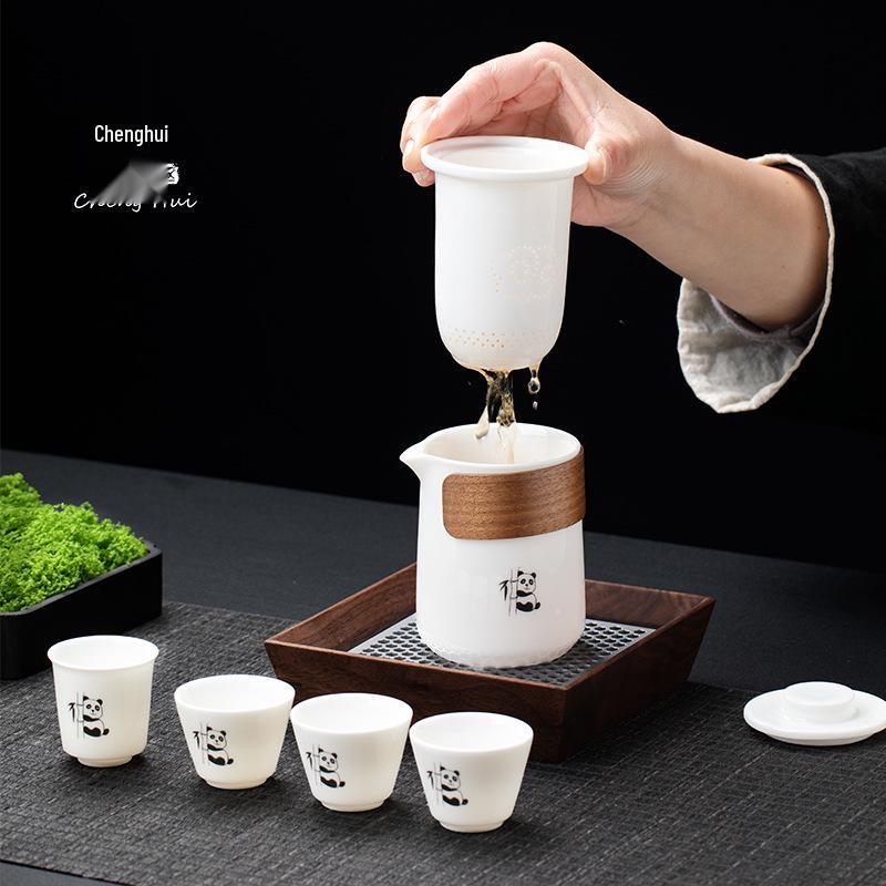 Premium Mutton Fat White Porcelain Panda Travel Tea Set - Portable Kung Fu Set with One Pot and Four Cups for Car, Outdoor, and Camping Use.