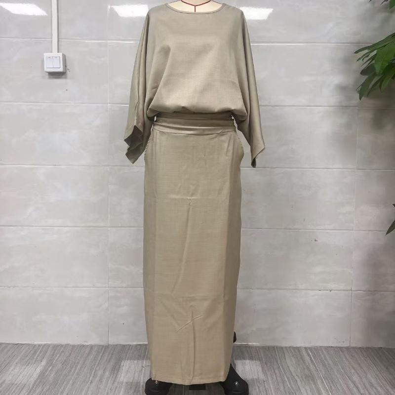 Women'S Fashion Featuring an Elegant Batwing Sleeve Crop Top with a Sexy Midriff Cut, Paired with a Versatile High-Waisted Skirt That Has a Back Slit