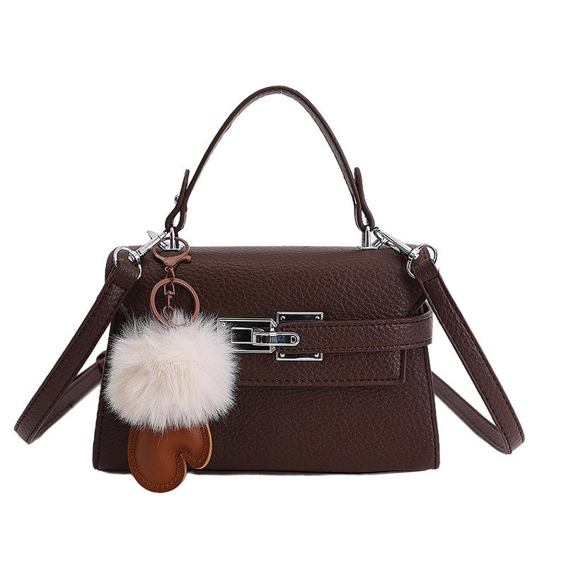 Elegant Commuting Bag for Work with A Chic Kelly Bag Style, Single-shoulder Cross-body Design.