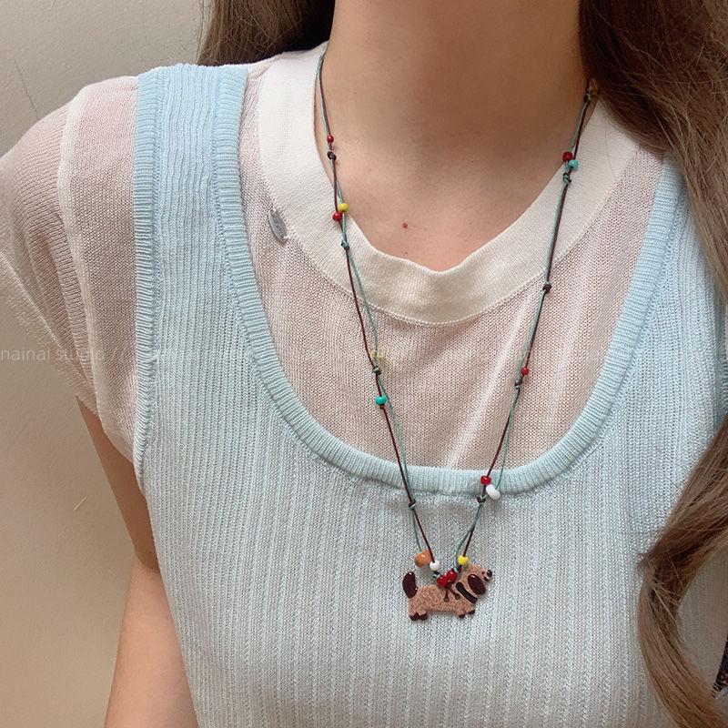 

Вощеная веревка мультяшный кулон в виде щенка ожерелье женская легкая роскошь высококлассная длинная цепочка для свитера нишевые уникальные универсальные аксессуары