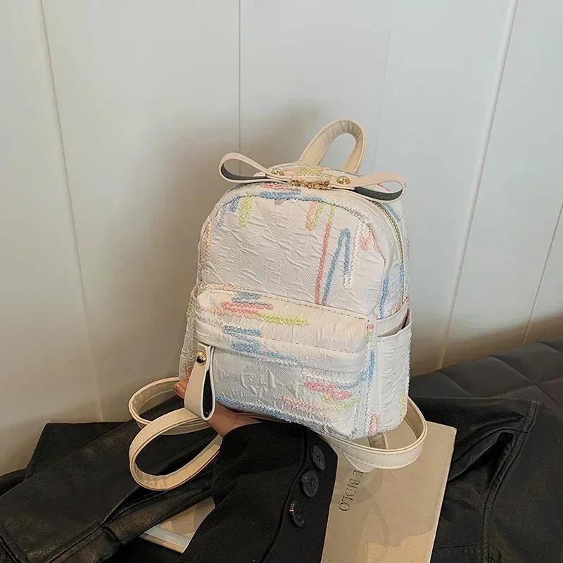 Sac à dos produit à fermeture éclair en nylon de couleur unie, ceinture à coussin d'air, sac à dos de mode haute beauté, nouveau sac souple style universitaire